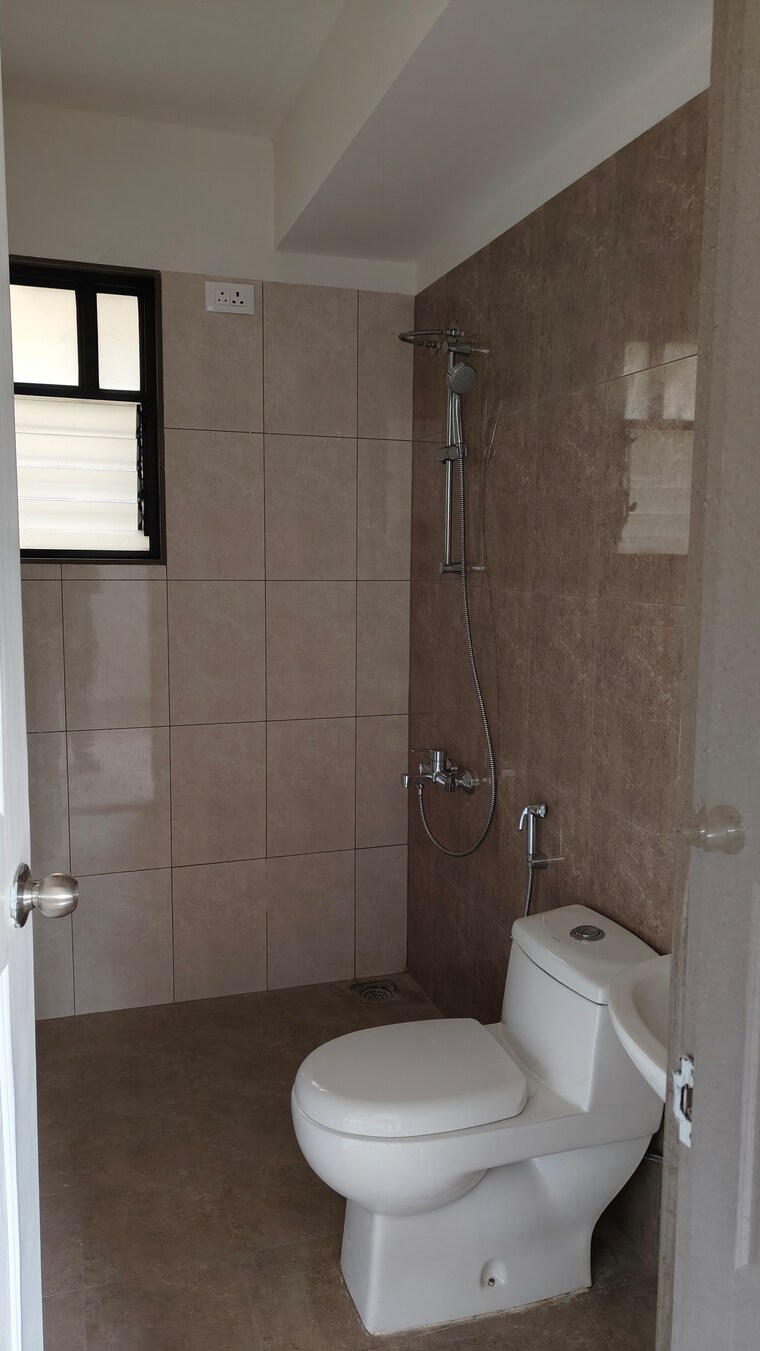 Master Bedroom, magarpatta-riverview-city 2 Bedroom 904 Sq.Ft. Apartment In Loni Kalbhor Pune 9376096