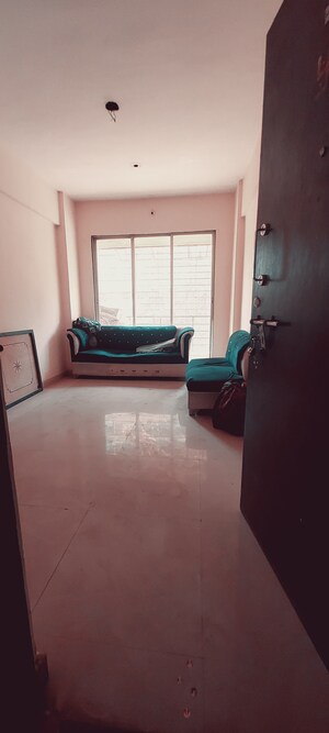 Living Room in 2 BHK Apartment at Dombivli West – for Sale
