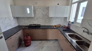 Kitchen in 3 BHK Apartment at NK Sharma Savitry Greens, Lohgarh – for Rent