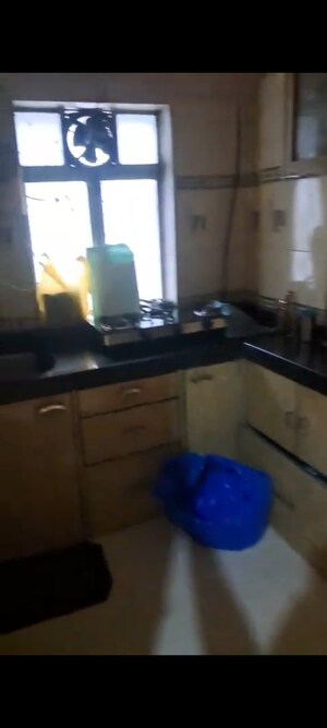 Kitchen in 1 BHK Apartment at Jumbo Darshan, Andheri East – for Rent