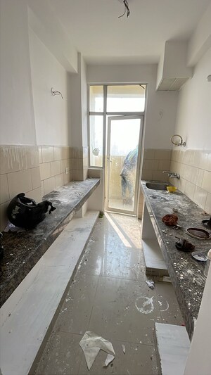 Kitchen in 2 BHK Apartment at Mahagun Mahagunpuram, Shastri Nagar – for Sale