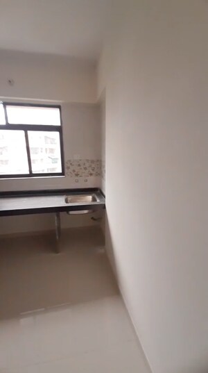 Kitchen in 2 BHK Apartment at Raj Tulsi Aaradhana, Badlapur East – for Sale