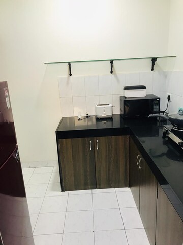 Kitchen in 1 BHK Apartment at Landmark Garden, Kalyani Nagar – for Rent