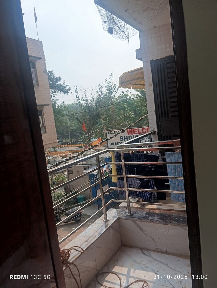 Balcony, rohini sector 25 2 Bedroom 350 Sq.Ft. Builder Floor In Rohini Sector 25 Delhi 9376358