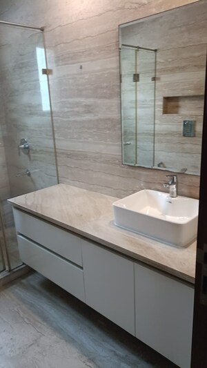 Bathroom in 4 BHK Builder Floor at Green Park Extension – for Rent