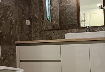 Bathroom in 4 BHK Builder Floor at Green Park Extension – for Rent