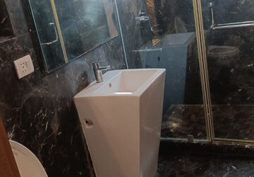 Bathroom in 4 BHK Builder Floor at Green Park Extension – for Rent