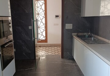 Kitchen in 4 BHK Builder Floor at Green Park Extension – for Rent