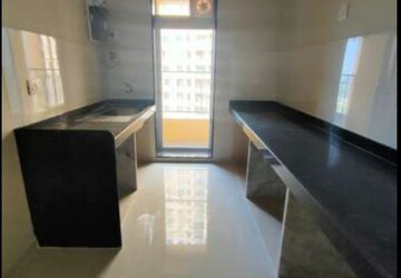 Kitchen in 2 BHK Apartment at Rustomjee Urbania Azziano, Thane West – for Sale