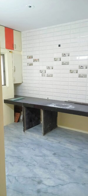 Kitchen in 2 BHK Apartment at Shree Hans Nagar CHS, Dhanori – for Rent