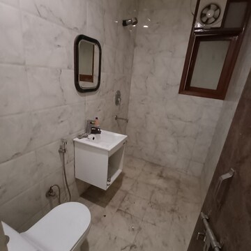 Bathroom in 2 BHK Builder Floor at Kalkaji – for Rent