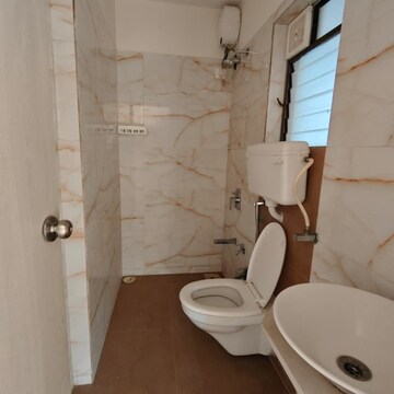 Bathroom in 3 BHK Apartment at Swastik Regalia, Kavesar – for Rent