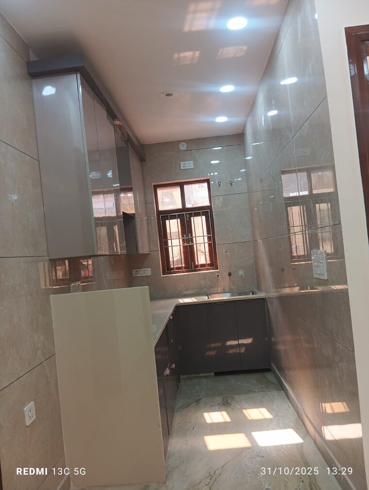 Kitchen, rohini sector 25 3 Bedroom 900 Sq.Ft. Builder Floor In Rohini Sector 25 Delhi 9376662