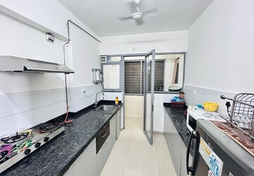 Kitchen in 2 BHK Apartment at Amanora Future Towers, Hadapsar – for Rent