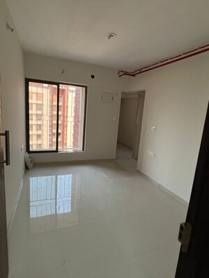 Room in 2 BHK Apartment at Kalpataru Immensa, Kolshet Road – for Rent
