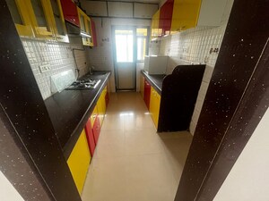 Kitchen in 3 BHK Apartment at Evershine Grandeur, Malad West – for Rent