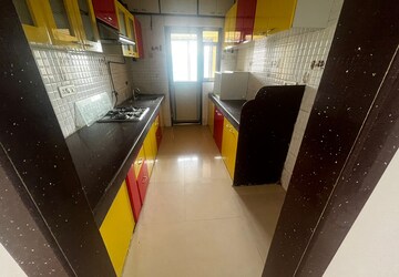 Kitchen in 3 BHK Apartment at Evershine Grandeur, Malad West – for Rent