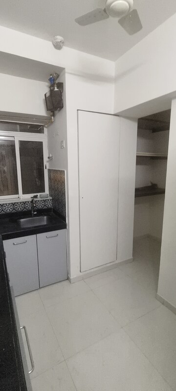 Kitchen in 1.5 BHK Apartment at Lodha Amara, Kolshet Road – for Sale