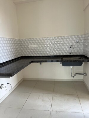 Kitchen in 2 BHK Apartment at Godrej Green Vistas, Mahalunge – for Rent