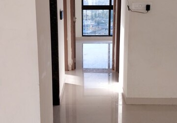 Building Lobby in 2 BHK Apartment at Rustomjee Meridian, Kandivali West – for Rent