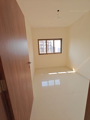 Room in 2.5 BHK Apartment at Lotus Sky Garden, Malad West – for Sale