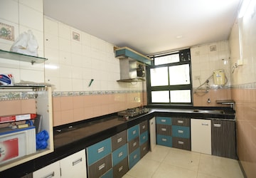 Kitchen in 2 BHK Apartment at Nandanvan Chs Nerul, Nerul Sector 17 – for Rent