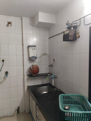 Kitchen in 2 BHK Apartment at Vijay Park CHS, Kandivali West – for Rent