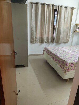 Bedroom in 2 BHK Apartment at Vijay Park CHS, Kandivali West – for Rent
