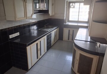 Kitchen in 3 BHK Apartment at Highland Park CHS Andheri, Andheri East – for Rent