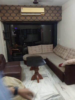 Living Room in 1 BHK Apartment at Riddhi Garden, Malad East – for Rent