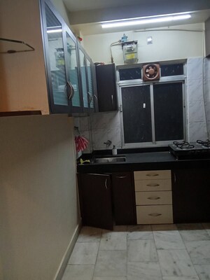 Kitchen in 1 BHK Apartment at Riddhi Garden, Malad East – for Rent