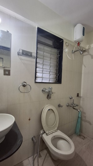 Bathroom in 2 BHK Apartment at Ekta Meadows, Borivali East – for Rent