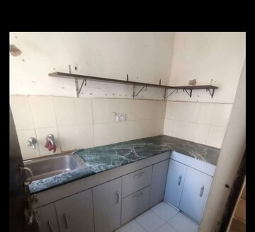 Kitchen in 1 BHK Apartment at Awadh Avenue, Amar Shaheed Path – for Sale