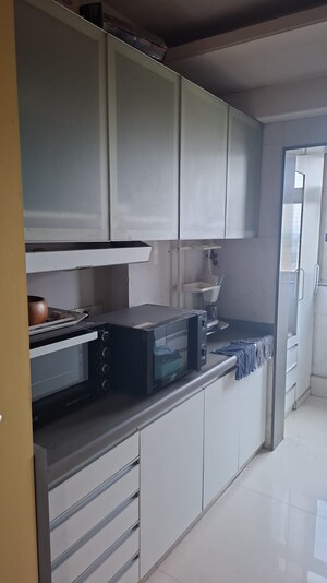 Kitchen in 3 BHK Apartment at Hiranandani Estate, Ghodbunder Road – for Rent