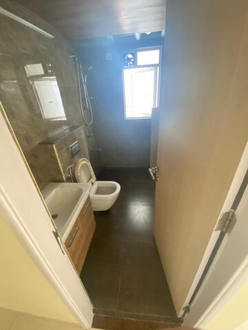 Bathroom in 2 BHK Apartment at Neminath Luxeria, Andheri West – for Rent