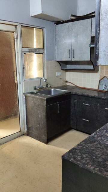 Kitchen in 3 BHK Apartment at Mahagun Maple, Sector 50 – for Rent