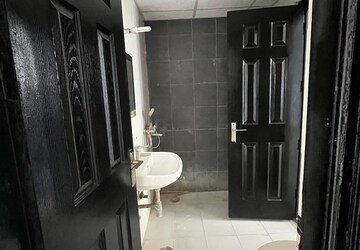 Bathroom in 2 BHK Apartment at Ajnara Integrity, Sehani Khurd – for Rent