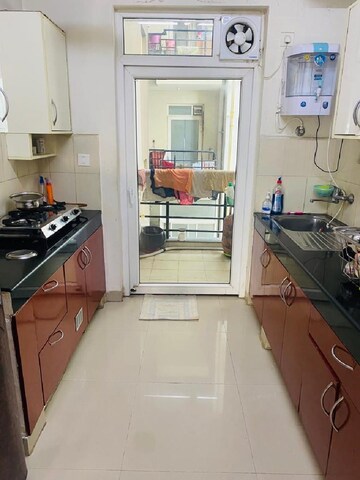 Kitchen in 3 BHK Apartment at Dhoot Time Residency, Sector 63 – for Rent