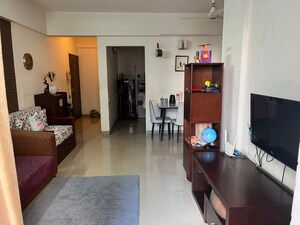 Living Room in 2 BHK Apartment at Gulmohar Goldcoast, Kharadi – for Rent