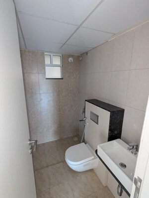 Bathroom in 2 BHK Apartment at Godrej Green Vistas, Mahalunge – for Rent