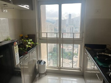 Kitchen in 1 BHK Apartment at Lodha Amara, Kolshet Road – for Sale