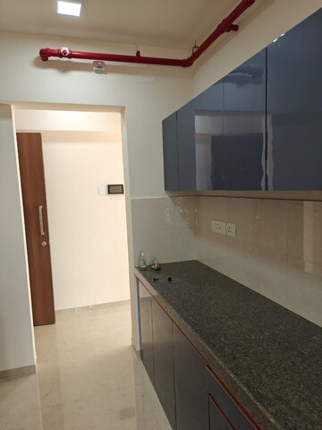 Kitchen in 2 BHK Apartment at Piramal Vaikunth, Balkum Pada – for Rent