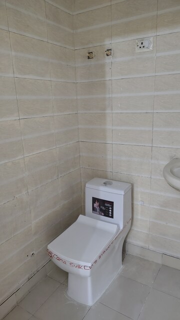 Bathroom in 3 BHK Builder Floor at Vasundhara Sector 1 – for Sale