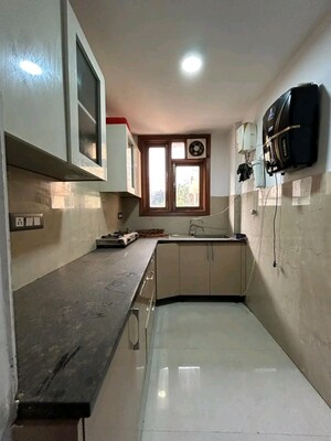 Kitchen in 2 BHK Builder Floor at Chattarpur – for Rent