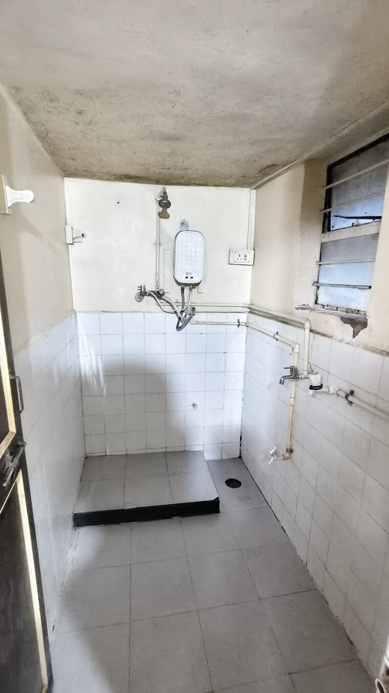 Bathroom, wadgaon sheri 1 Bedroom 584 Sq.Ft. Apartment In Wadgaon Sheri Pune 9380869