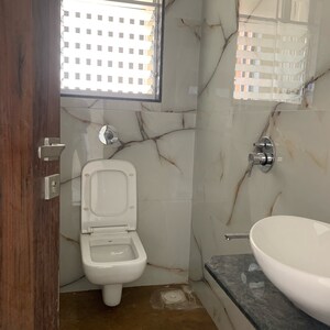Bathroom in 2 BHK Apartment at Nisar Rajal Veer Abhimanyu CHS, Kastur Park – for Rent