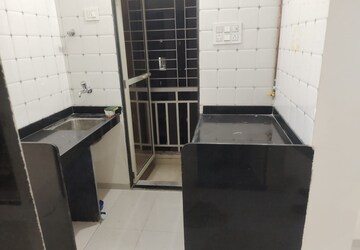 Kitchen in 1 BHK Apartment at Sundar Sarovar Complex, Mira Road East – for Sale