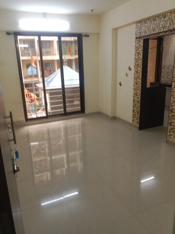 Living Room in 1 BHK Apartment at Ornate Galaxy, Naigaon East – for Rent