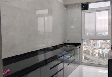 Kitchen in 2 BHK Apartment at Tricity Montview, Sanpada – for Rent