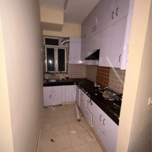 Kitchen in 2 BHK Apartment at Shree Vardhman Mantra, Ramgarh Dhani – for Rent